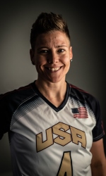 A headshot photo of Asya Miller wearing a white USA jersey.
