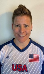 Headshot photo of Asya Miller wearing a white USA jersey with an American flag on the chest.