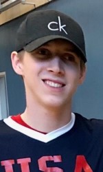 A headshot photo of Christian King wearing a black baseball hat with the initials "CK" on the front.