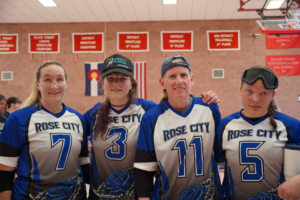 Eliana Mason, Taylor Moses, Jen Ambruster and Reese Branch Post for a photo in their white with blue numbers Rose City Thorns Jerseys after winning the Women's 2026 Goalball National Title