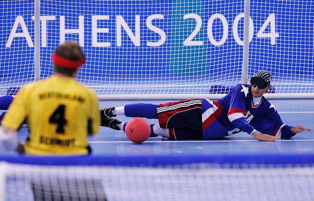 Tyler Merren blocks a ball with his legs on a throw from Germany.