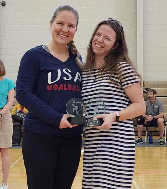Women's co-MVPs Mindy Cook and Megan Jenson pose with their award