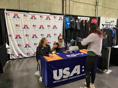 Alison Lynch and Rob Sanchas talk to competitors during the CIM Expo in December