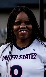 A headshot photo of Shavon Lockhardt wearing a white USA jersey.